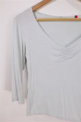 חולצה מנוקדת בתכלת- M-L